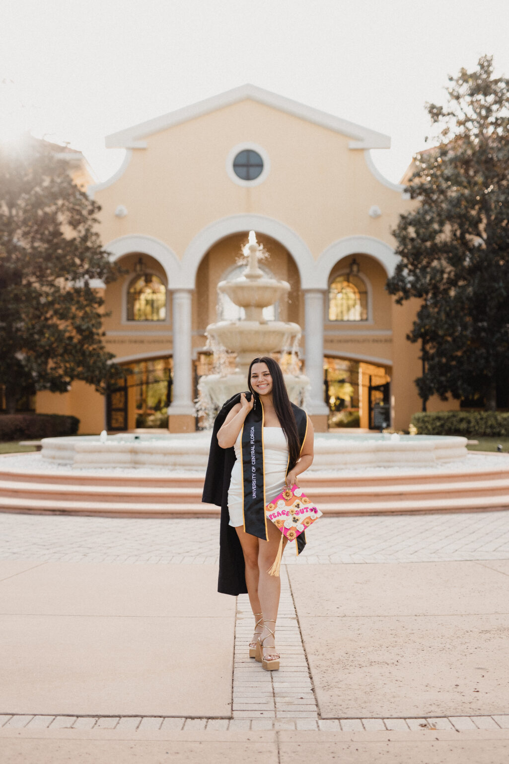 local ucf orlando graduation grad photographer photographers photography packages university of central florida photo Rosen college of hospitality campus Valencia grads